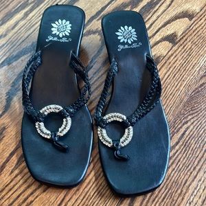 Cute low wedge dressy sandal. Size 6